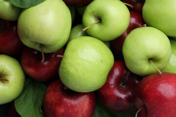 Fresh ripe green and red apples as background, top view