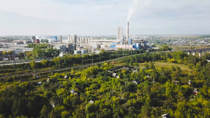 Top view of city's industrial district in summer. Stock footage. Industrial plants, businesses and...