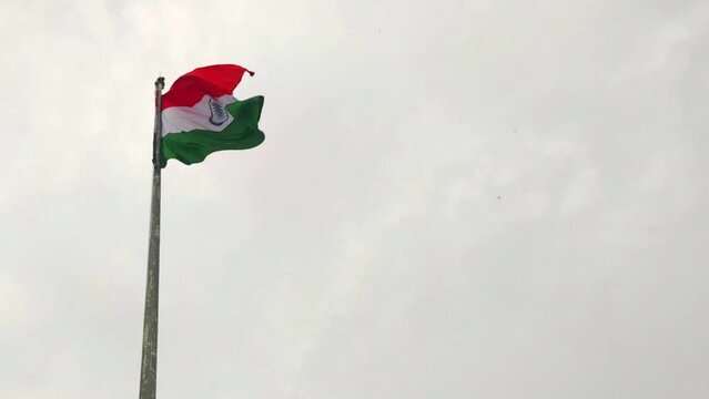 Indian flag waving in the air under the sky