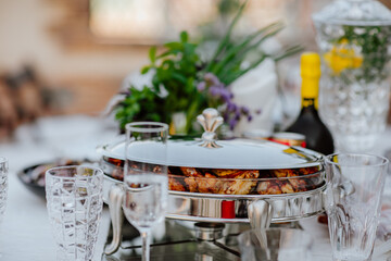 Served party table on white background. Atmosphere of celebration.