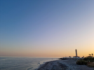Landscape view of the torrox lighthouse and the mediterranean sea