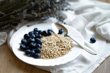 Blueberry and oatmeal for breakfast. Healthy Eating