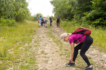 a woman is preparing for trekking