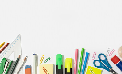 Back to school background with copy space. Variety of Office and school supplies on white background