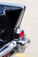 Fototapeta premium Red Tail Light and Black Fin of Classic Car