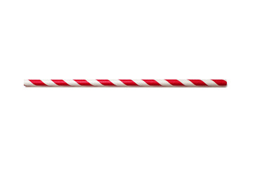 A red and white drinking straw is located on a white background. The concept of a children's holiday or party. A handy drinking accessory. Eco-friendly paper straw for drinking beverages