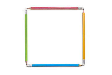 A square assembled from multi-colored pencils on a white background. Red, green, yellow and blue pencil on a white isolated background. Geometric figure of four pencils