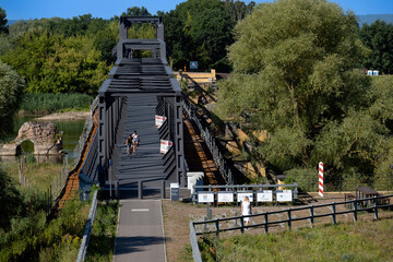 Siekierki, Zachodniopomorskie / Poland - August 01 2022 Tourist bridge on foot on a bicycle on the Polish-German border