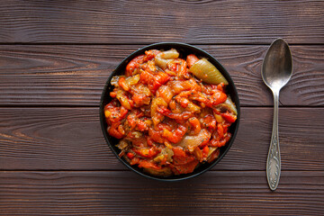 Delicious autumn vegetables, natural nutrition food on brown wooden table, top view. 