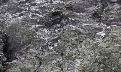 Background texture in the form of frozen lava of an extinct volcano