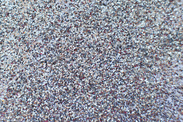 glittering background of silver sequins closeup. Sparkle festive texture