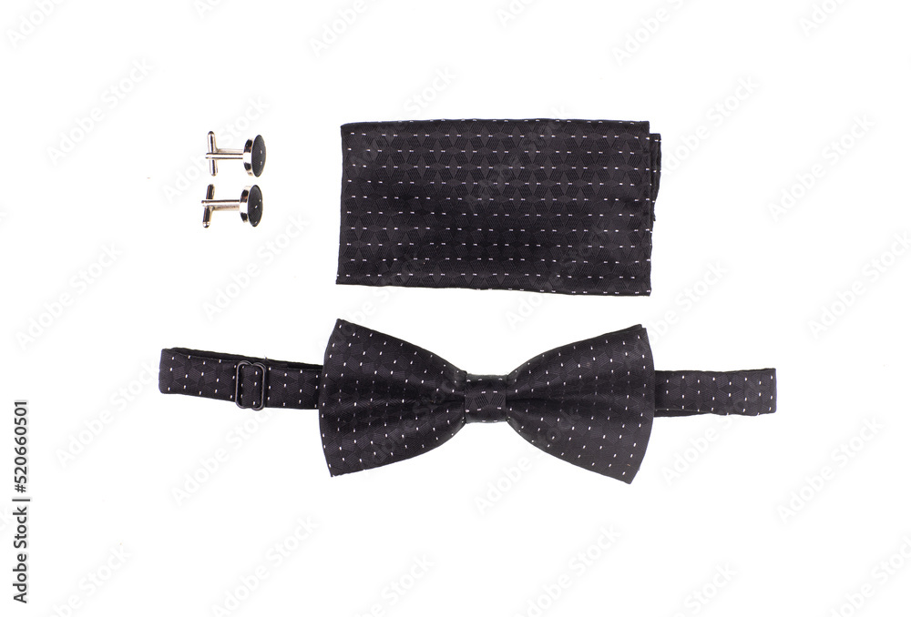 Wall mural black speckled bow tie isolated on white background