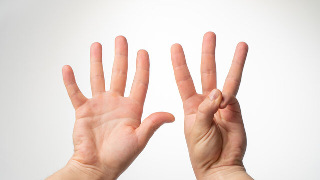 Men's hands gesture counting on fingers eight palmar side