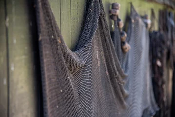 Foto op Canvas Enkhuizen, Netherlands. June 2022. Close up of drying fishing nets. © Bert