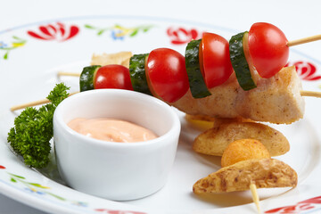 chicken kebab with baked potato