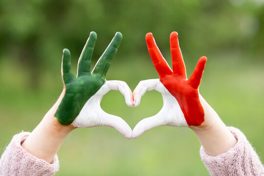 Child hands in heart shape painted in Mexico flag color. Love Mexico. Concept of Mexican patriotism and pride. Mexican Independence Day 16 September. February 5 Day of Conference. February 24 National