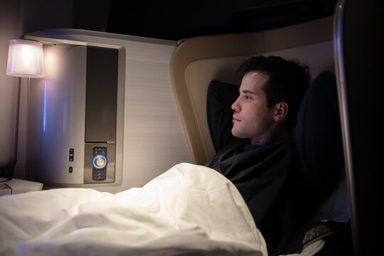 First class airline passenger ready for bed