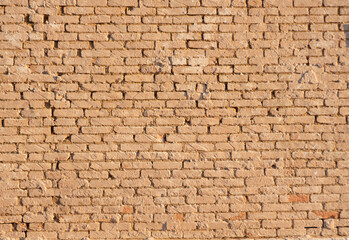 Brick wall, a brick wall with a beautiful texture in a small town in Brazil, natural light, selective focus.