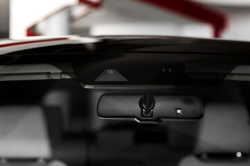 front Car CCTV camera video recorder, dash cam, for driving safety on the road. back view. Concept of safety camera for car protection, technology for safety