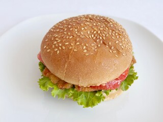 hamburger on plate isolated on white 