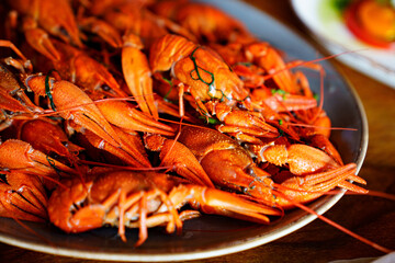 an appetizer with beer from whole boiled river crayfish.