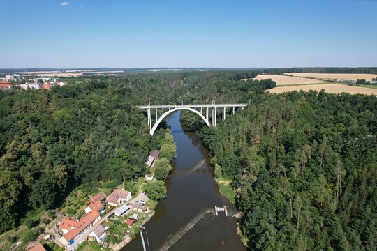 Bechyne Bridge or Bechyne Rainbow, rarely Rainbow Bridge is a unique reinforced concrete arch bridge over the river Luznice. Aerial view to monument in Czech Republic, Central Europe,for cars,trains