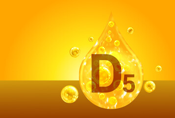 Vitamin D5. Golden drops with oxygen bubbles. Health concept