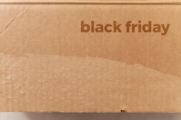 Detail of a cardboard box written on black friday. Delivery box. cardboard box concept. black friday concept