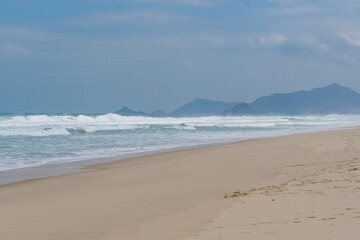 Reserva Beach, in Rio de Janeiro. Sunny day with some clouds. Empty beach