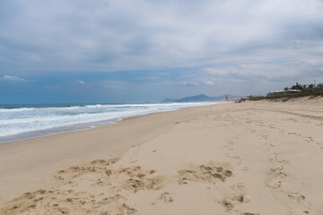 Reserva Beach, in Rio de Janeiro. Sunny day with some clouds. Empty beach