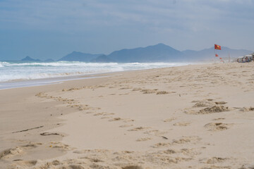 Reserva Beach, in Rio de Janeiro. Sunny day with some clouds. Empty beach