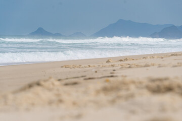 Reserva Beach, in Rio de Janeiro. Sunny day with some clouds. Empty beach