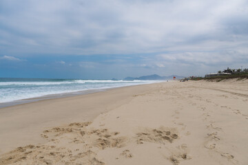 Reserva Beach, in Rio de Janeiro. Sunny day with some clouds. Empty beach