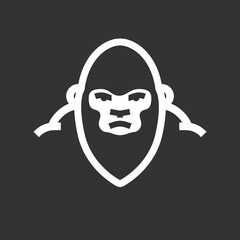 Logo concept with the image of a gorilla. Vector illustration. Dark isolated background.