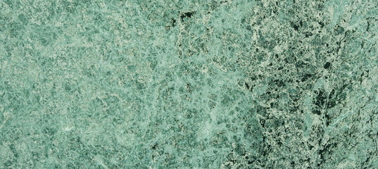Fototapeta na wymiar Green marble. Natural stone wall with abstract pattern.