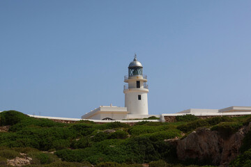 Cape de Cavalleria - the northernmost point of the Minorca island. Lighthouse on the Cap de Cavalleria. Minorca (Menorca), Spain