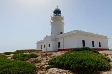Fototapeta na wymiar Cape de Cavalleria - the northernmost point of the Minorca island. Lighthouse on the Cap de Cavalleria. Minorca (Menorca), Spain