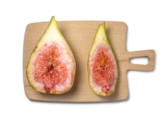 sliced figs on a cutting board. Juicy ripe fruit on a white background. Diet food. Fig isolate....