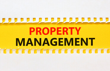 Property management symbol. Concept words Property management on yellow paper on a beautiful white background. Business property management concept. Copy space.