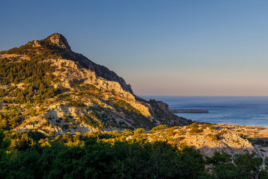 Rocky coast with Tsambika beach on the island of Rhodes, Greece, Europe.