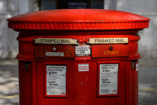Closeup of an old traditional British red Postbox