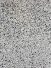 he texture of the concrete , grey stone background , wall of cement, a fragment of a concrete slab