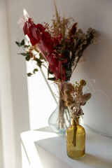 A delightful bouquet of peonies in a vase on the table.