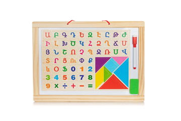 Magnetic board in a wooden frame with a marker and the letters of the Armenian alphabet on a white background.
