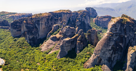 astonishing aerial view of Meteora rock towers in the sunny weather, Greece. High quality photo