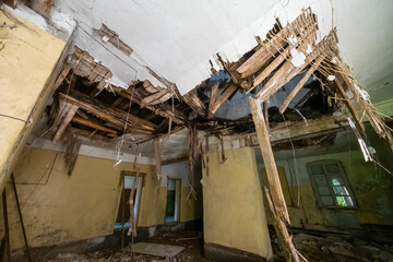 Broken ceiling inside derelict building