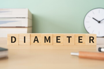 直径のイメージ｜「DIAMETER」と書かれたブロックが置かれたデスク
