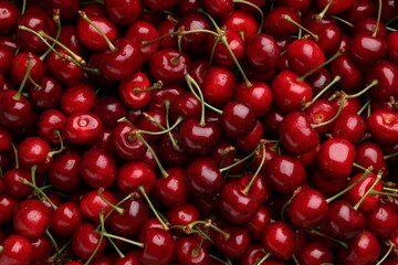 Ripe sweet cherries as background, top view