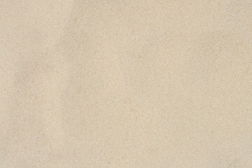 Fototapeta na wymiar Texture of sandy beach as background, top view