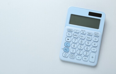 Modern calculator on white background, top view. Space for text - obrazy, fototapety, plakaty